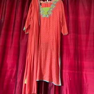 Orange shalwar kameez with roses